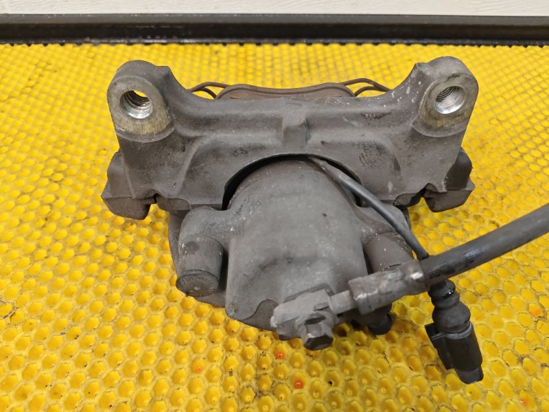 Суппорт передний левый Volkswagen Tiguan