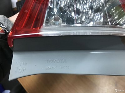 Фонарь задний левый оригинал Toyota Corolla 151