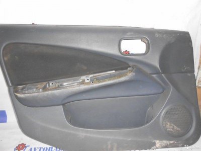 Обшивка двери передняя левая Nissan Almera N16