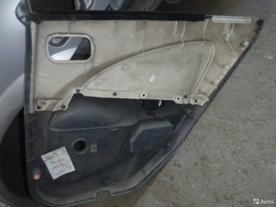 Обшивка двери задняя левая Nissan Almera N16 QG15