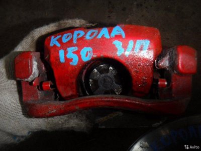 Суппорт задний правый Toyota Corolla 151 150 E15