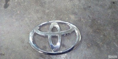 Эмблема задняя Toyota Land Cruiser Prado J150 1KD