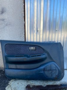 Обшивка боковой двери Nissan Almera N15