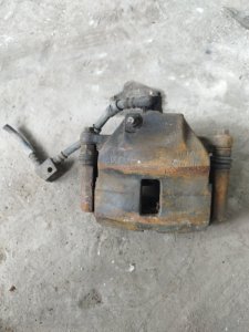Суппорт тормозной Nissan Primera P10