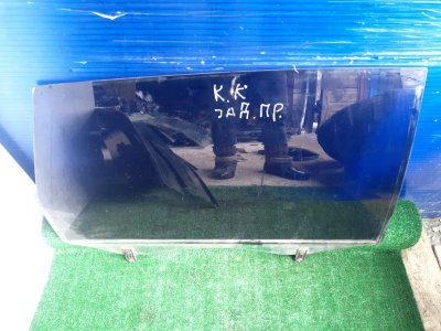 Стекло двери Kia Carens 2