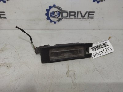 Фонарь подсветки номера Opel Astra H