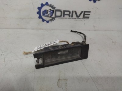 Фонарь подсветки номера Opel Astra H