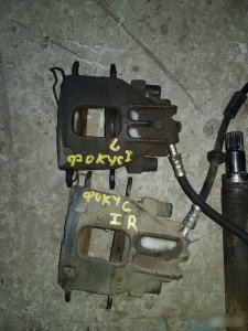 Суппорт тормозной Ford Focus 1