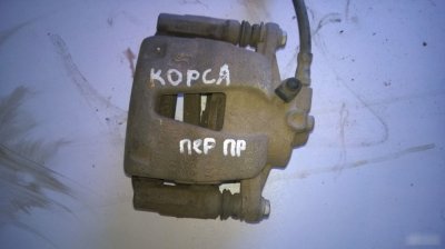 Суппорт тормозной Opel Corsa D