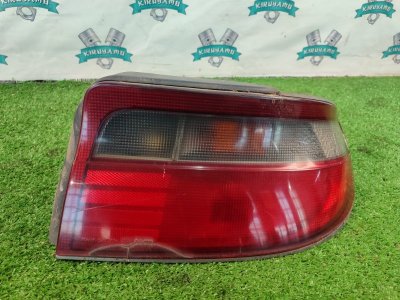 Фонарь заднего хода Toyota carina 1993 ST190