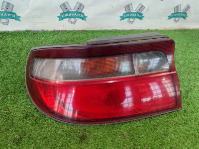 Фонарь заднего хода Toyota carina 1993 ST190