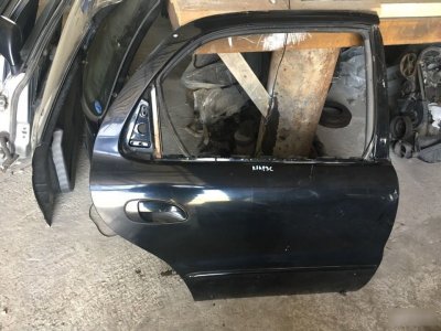 Дверь Kia Clarus