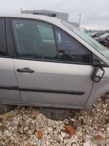 Дверь Renault Scenic 2