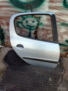 Дверь Peugeot 206
