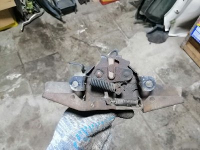 Замок капота Toyota Corolla E120