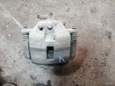 Суппорт тормозной Nissan Primera P12