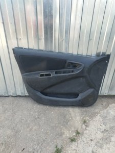 Обшивка боковой двери Geely MK 2008