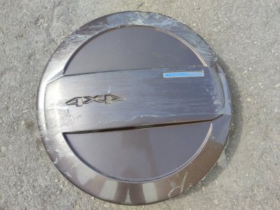 Колпак запасного колеса нива шевроле