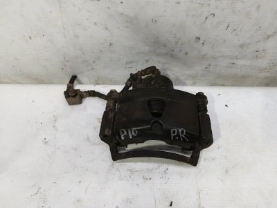 Суппорт Nissan Primera 1990