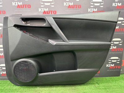 Обшивка двери Mazda 3 BL