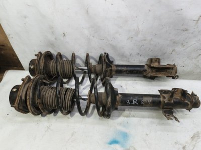 Амортизатор Nissan Primera 1990