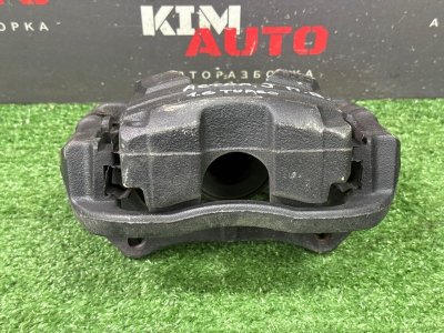 Суппорт тормозной Opel Astra J