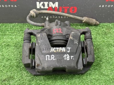 Суппорт тормозной Opel Astra J