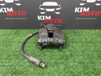 Суппорт тормозной Opel Astra