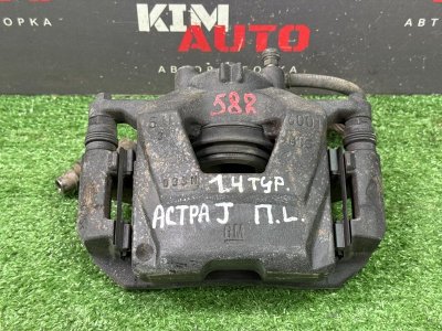 Суппорт тормозной Opel Astra J