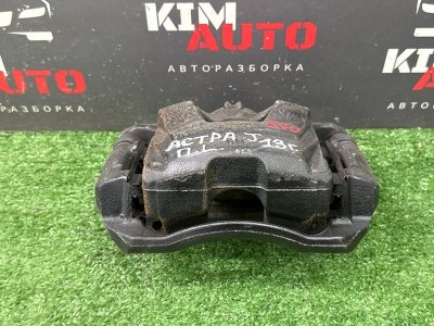 Суппорт тормозной Opel Astra J