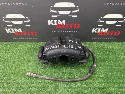 Суппорт тормозной Skoda Octavia A5