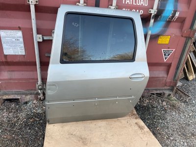 Дверь Lada Largus 2013