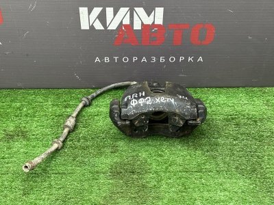 Суппорт тормозной Ford Focus 2
