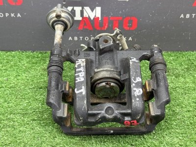 Суппорт тормозной Opel Astra J