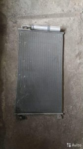 92100EL00A Радиатор кондиционера Nissan Tiida